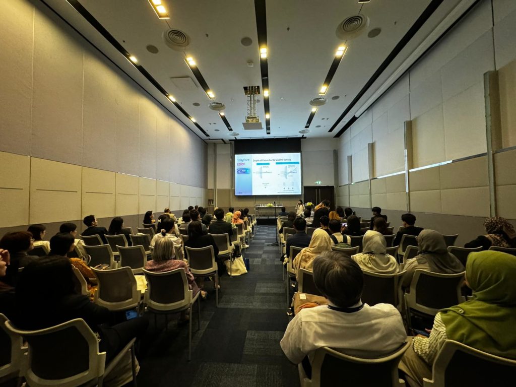 Participants listening attentively to talk contact lens contact lens